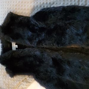 Sebby size medium furry black vest with sweater back